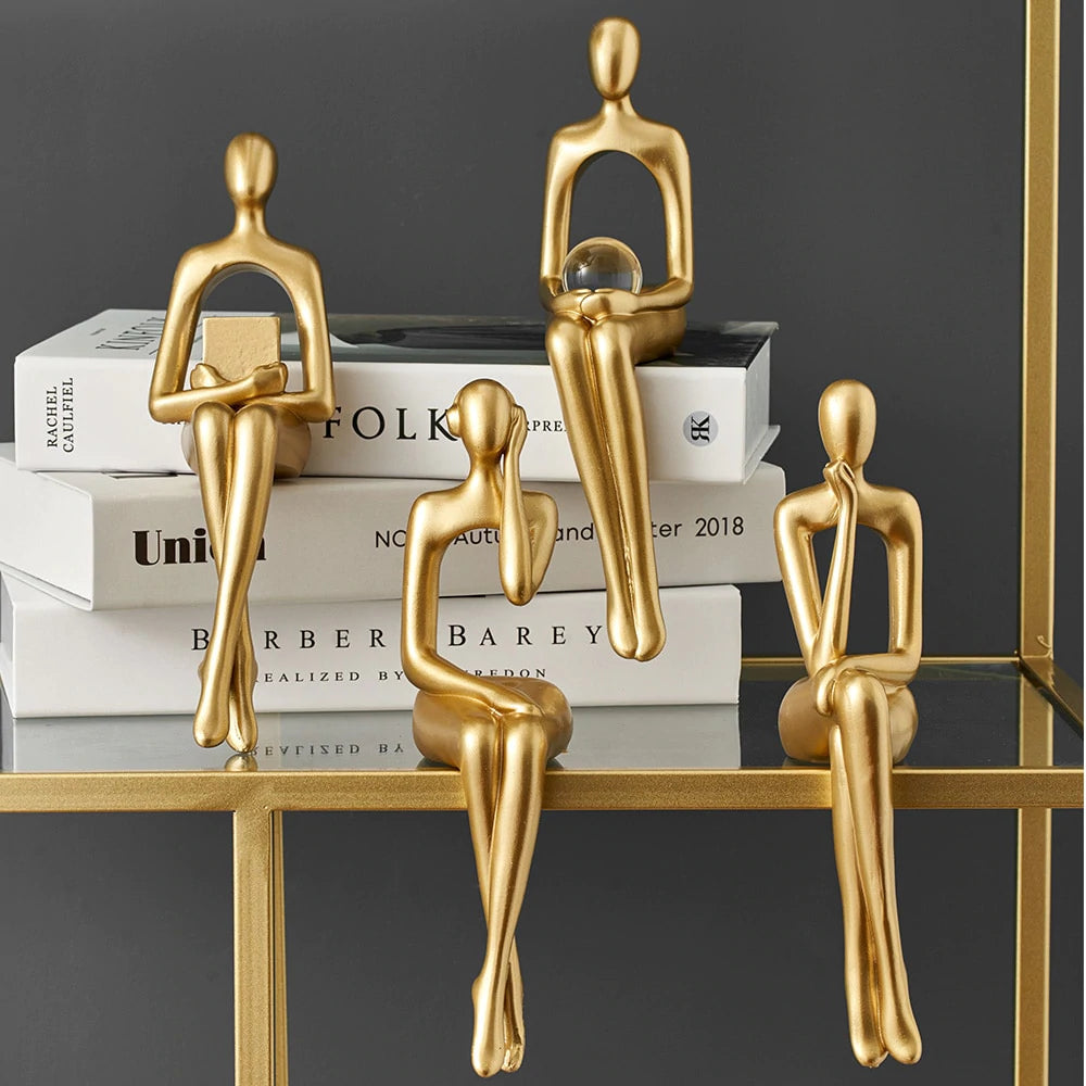 Golden Abstract Figurines